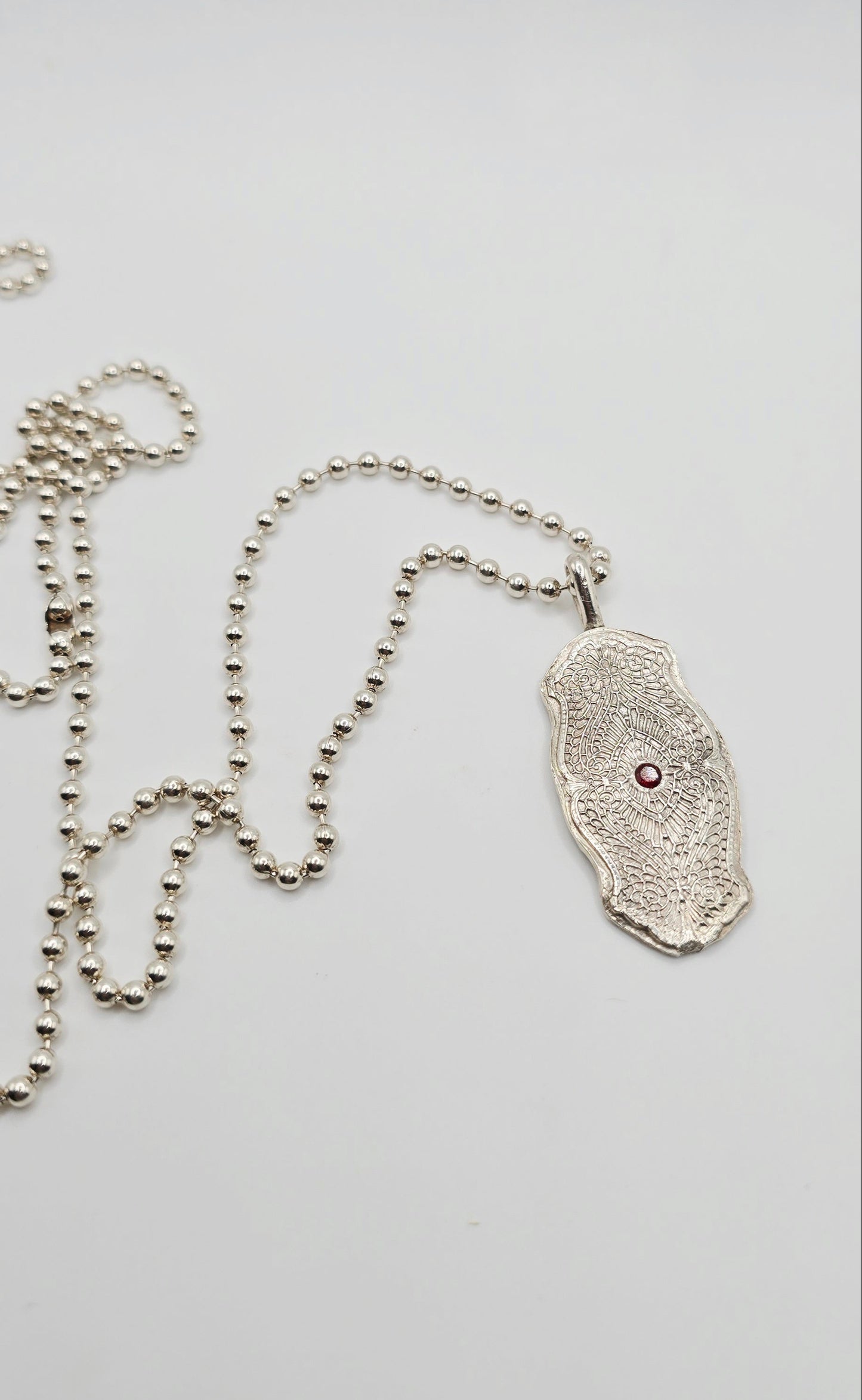 Ornate Garnet Necklace in Sterling Silver