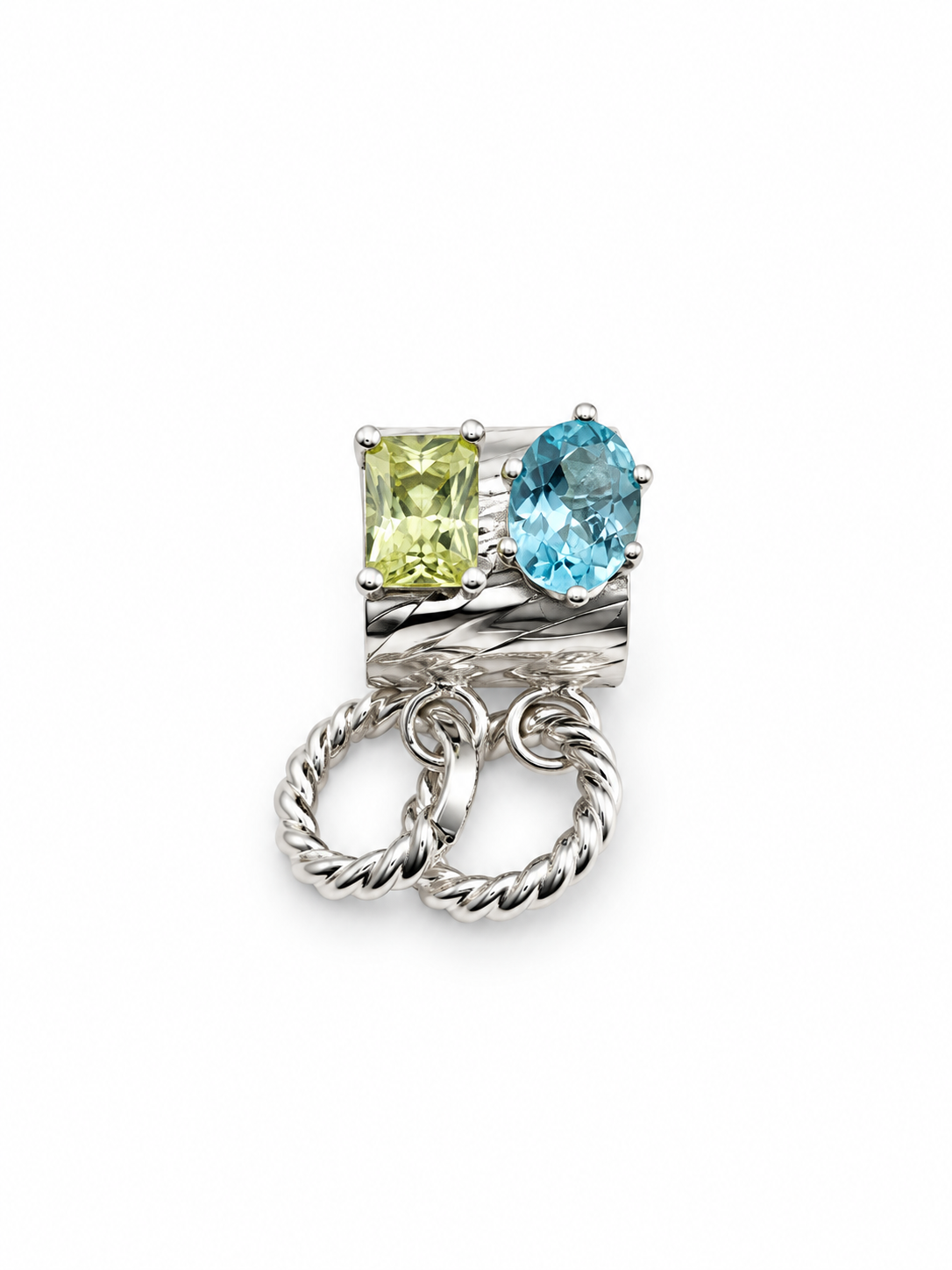Sculptural sterling silver ear cuff featuring an oval blue apatite and rectangular lemon quartz gemstones, with removable twisted silver hoops, from Jill Melyssa’s Elemental Collection.