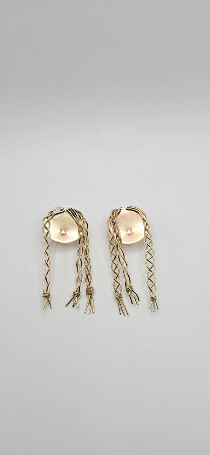 Pair of gold brass earrings of a little girl with braids by Jill Melyssa