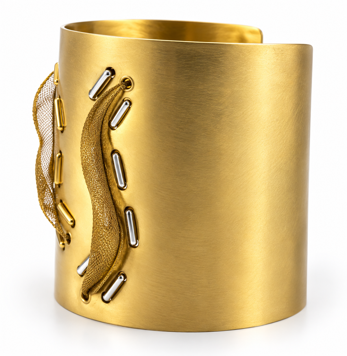Two Truths one of a kind brass cuff bracelet shown from an angled view, highlighting the curved brass structure, flexible mesh detailing, and mixed metal stitching.